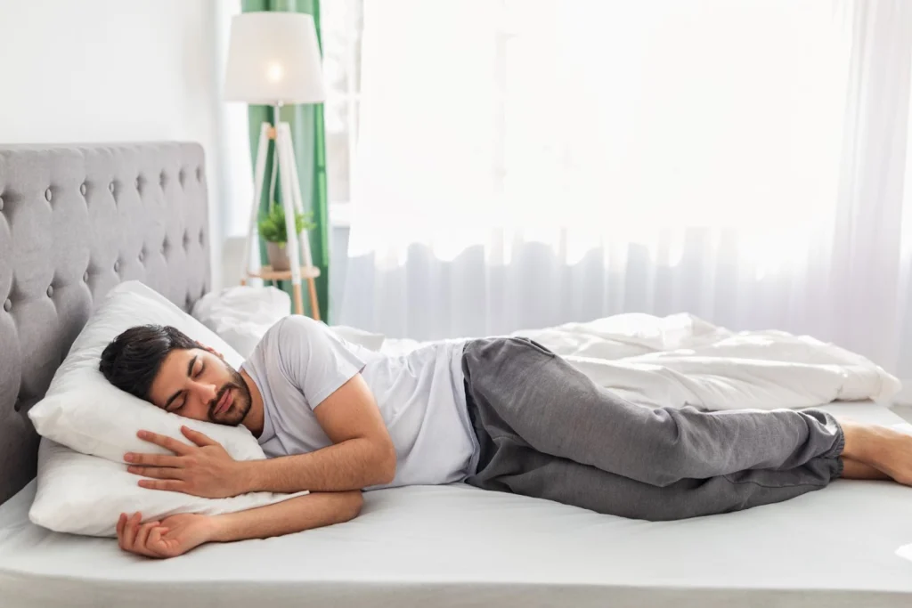 Side sleeping man
